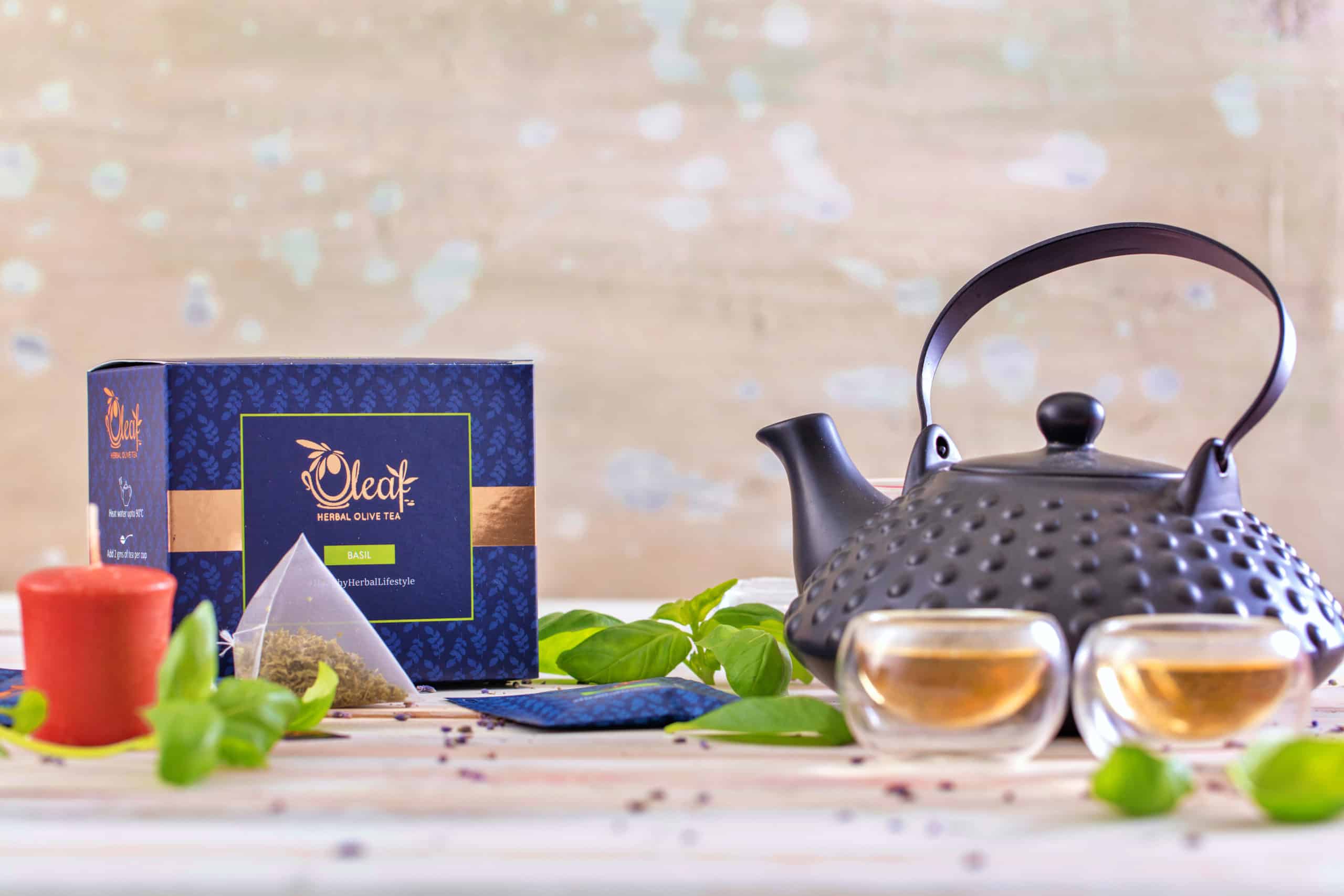 Oleaf olive tea 100g box with kettle and cup of tea
